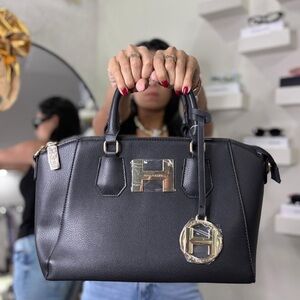 Halston Dome Zip Satchel Black Bags
Faux leather nwt with crossbody strap